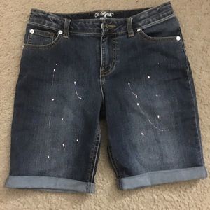 Denim shorts with paint splatters